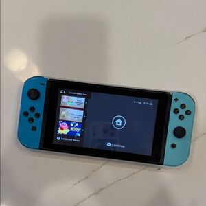 Nintendo Handheld Console with Blue Joy-Con